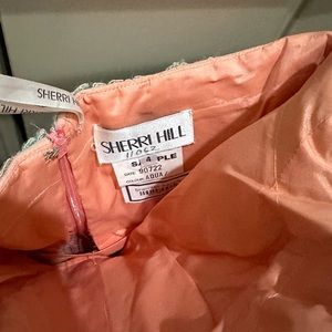 Beautiful Sherri Hill dress. Aqua and peach with beautiful detail